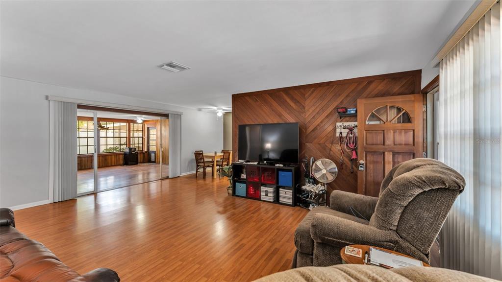 115 Morrow Circle Brandon, FL 33510 - Photo 34 of 48 a living room with furniture and wooden floor