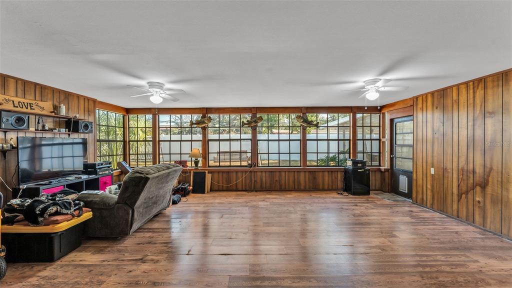 115 Morrow Circle Brandon, FL 33510 - Photo 35 of 48 a bedroom with furniture and a large window