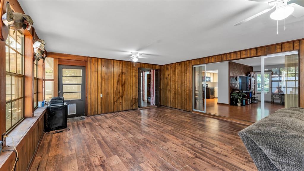 115 Morrow Circle Brandon, FL 33510 - Photo 36 of 48 a view of empty room with wooden floor and windows