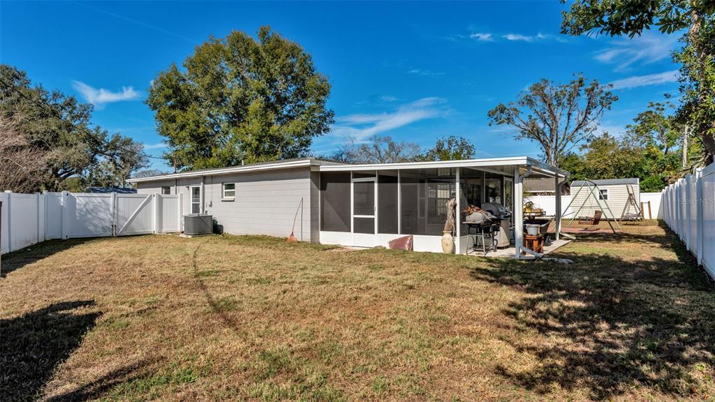 115 Morrow Circle Brandon, FL 33510 - Photo 39 of 48 a view of a house with a yard and garage