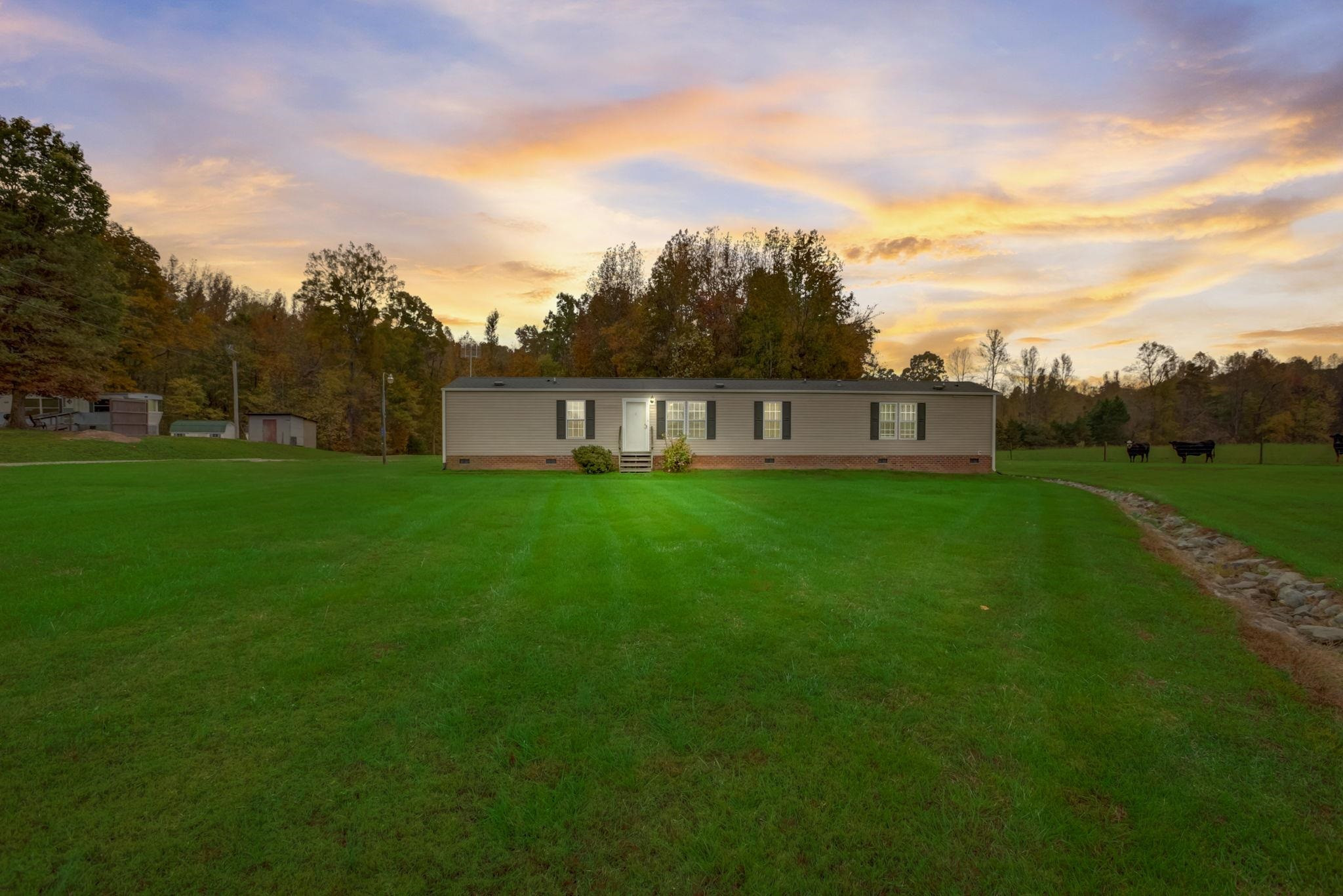 257 Marvin Gill Road Roxboro, NC 27574 - Photo 1 of 34 a view of a house with a big yard