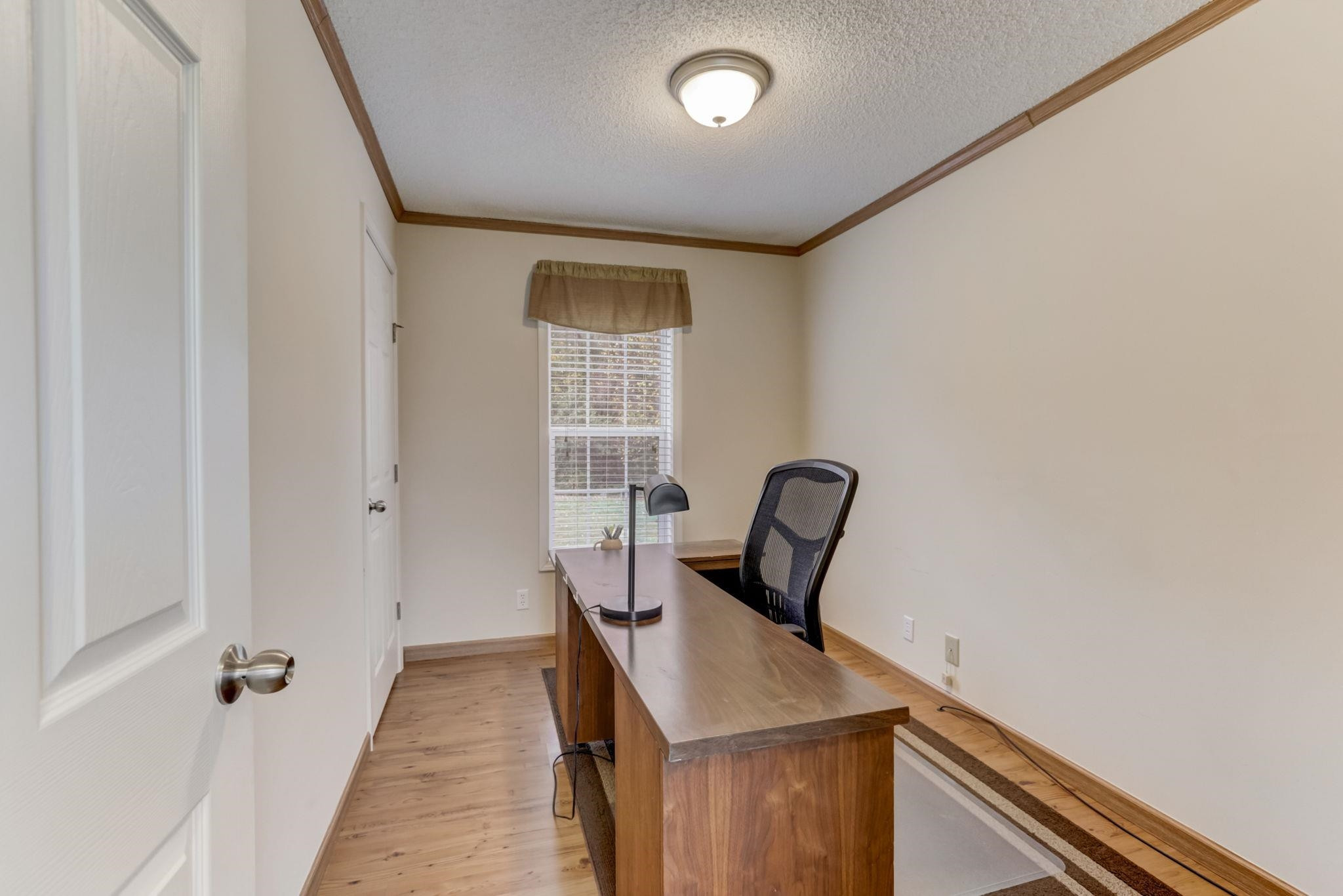 257 Marvin Gill Road Roxboro, NC 27574 - Photo 16 of 34 a view of a hallway with furniture and window