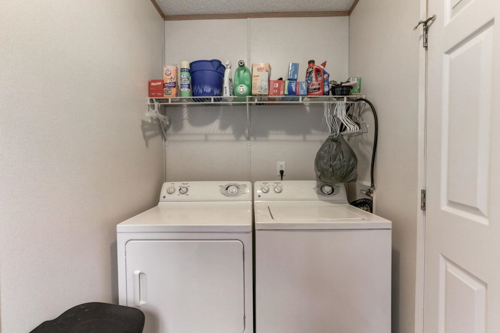 257 Marvin Gill Road Roxboro, NC 27574 - Photo 18 of 34 a utility room with dryer and washer