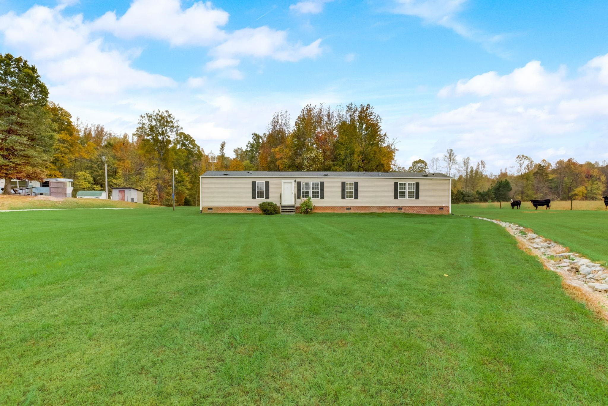 257 Marvin Gill Road Roxboro, NC 27574 - Photo 23 of 34 a view of a house with a big yard