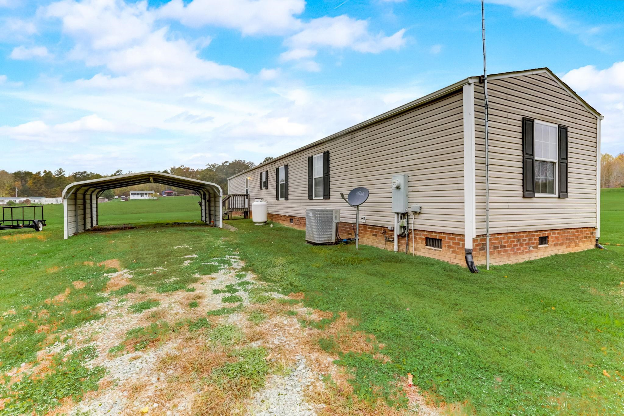 257 Marvin Gill Road Roxboro, NC 27574 - Photo 28 of 34 a front view of a house with garden