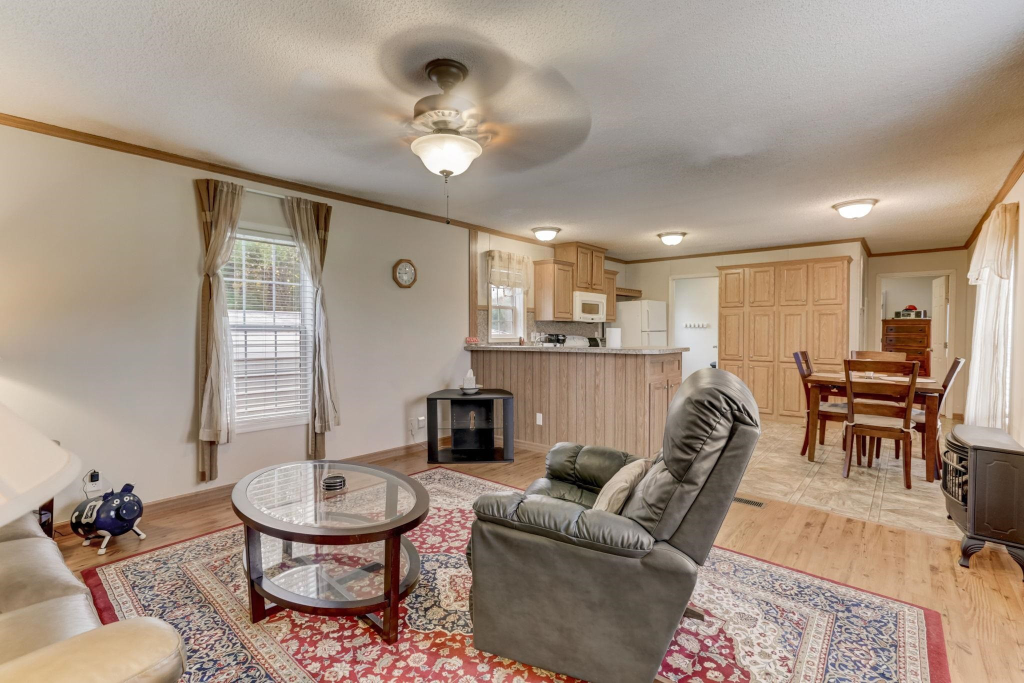 257 Marvin Gill Road Roxboro, NC 27574 - Photo 3 of 34 a living room with furniture and a table