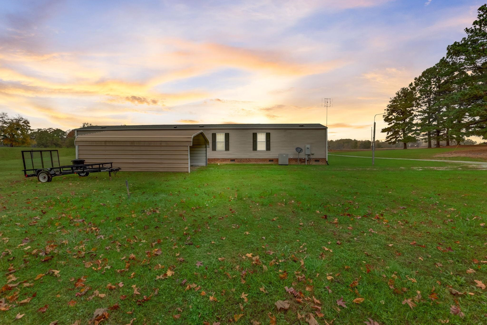 257 Marvin Gill Road Roxboro, NC 27574 - Photo 34 of 34 a view of a house with a yard and sitting area