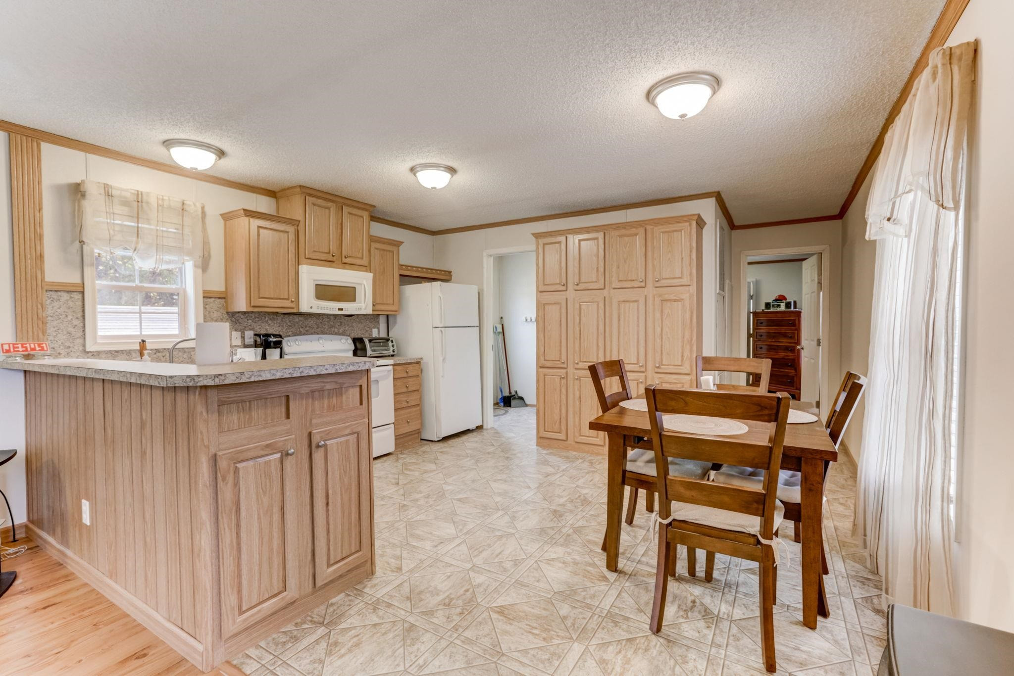 257 Marvin Gill Road Roxboro, NC 27574 - Photo 4 of 34 a kitchen that has a cabinets counter space and appliances