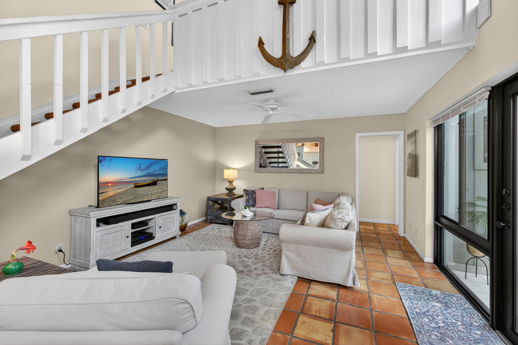 1605 Highway 1, Unit 14E Jupiter, FL 33477 - Photo 9 of 34 Living room with lofted overlook
