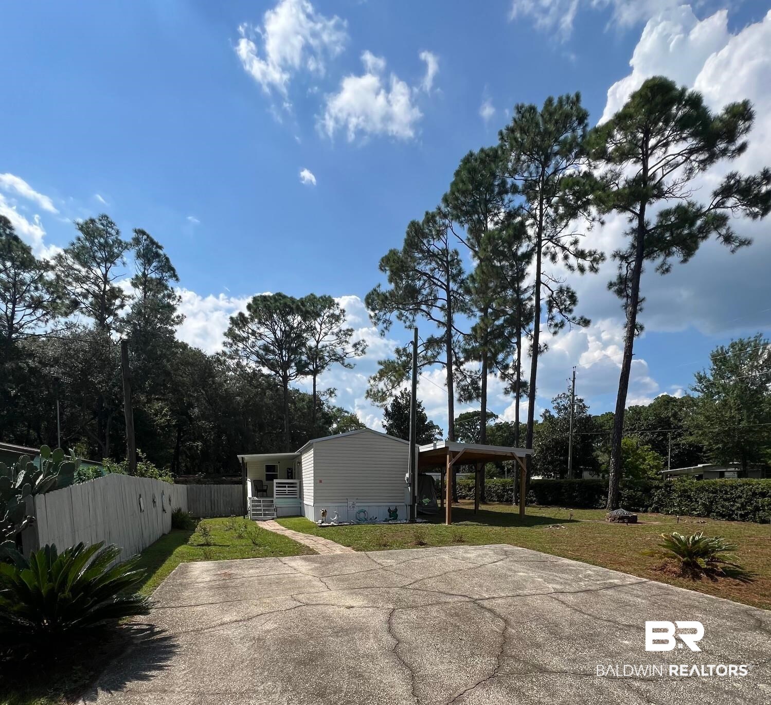 1420 Ridgewood Circle Lillian, AL 36549 - Photo 17 of 41 Exterior space with a carport