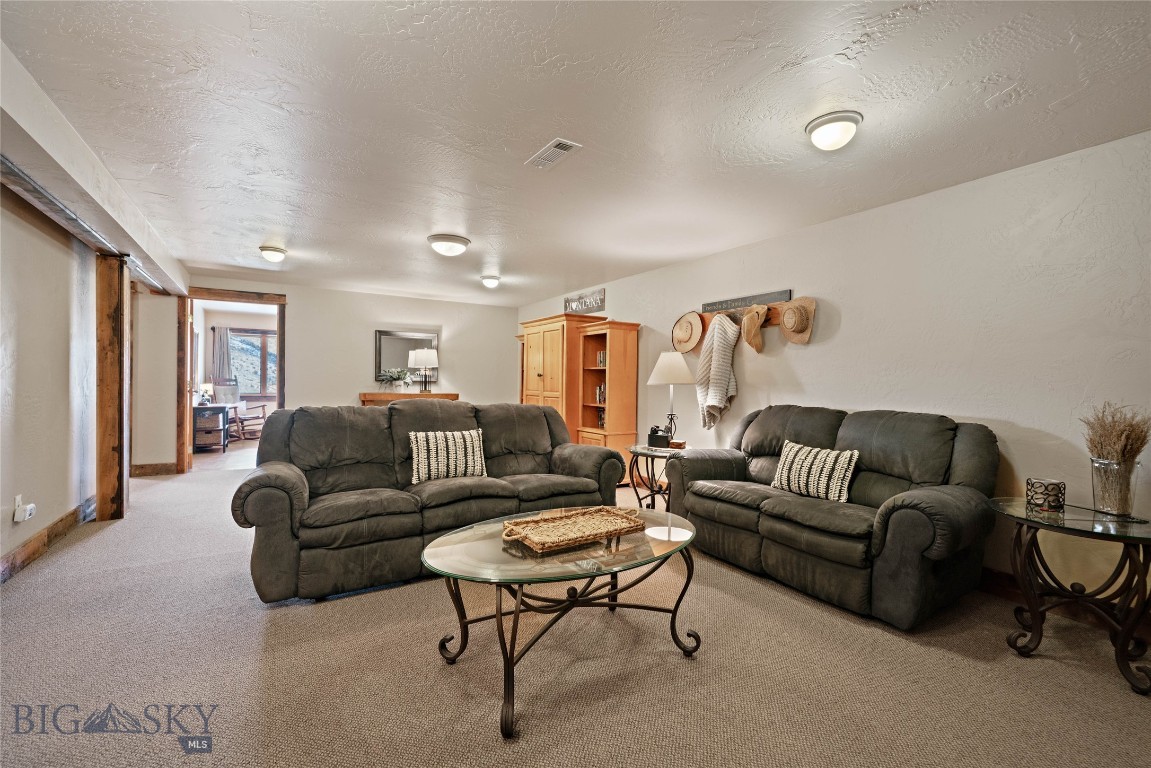 1460 Horseshoe Gulch Road Manhattan, MT 59741 - Photo 76 of 99 Basement Living Room