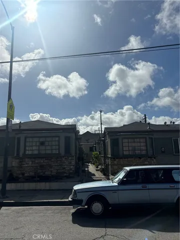 a car parked in front of a house