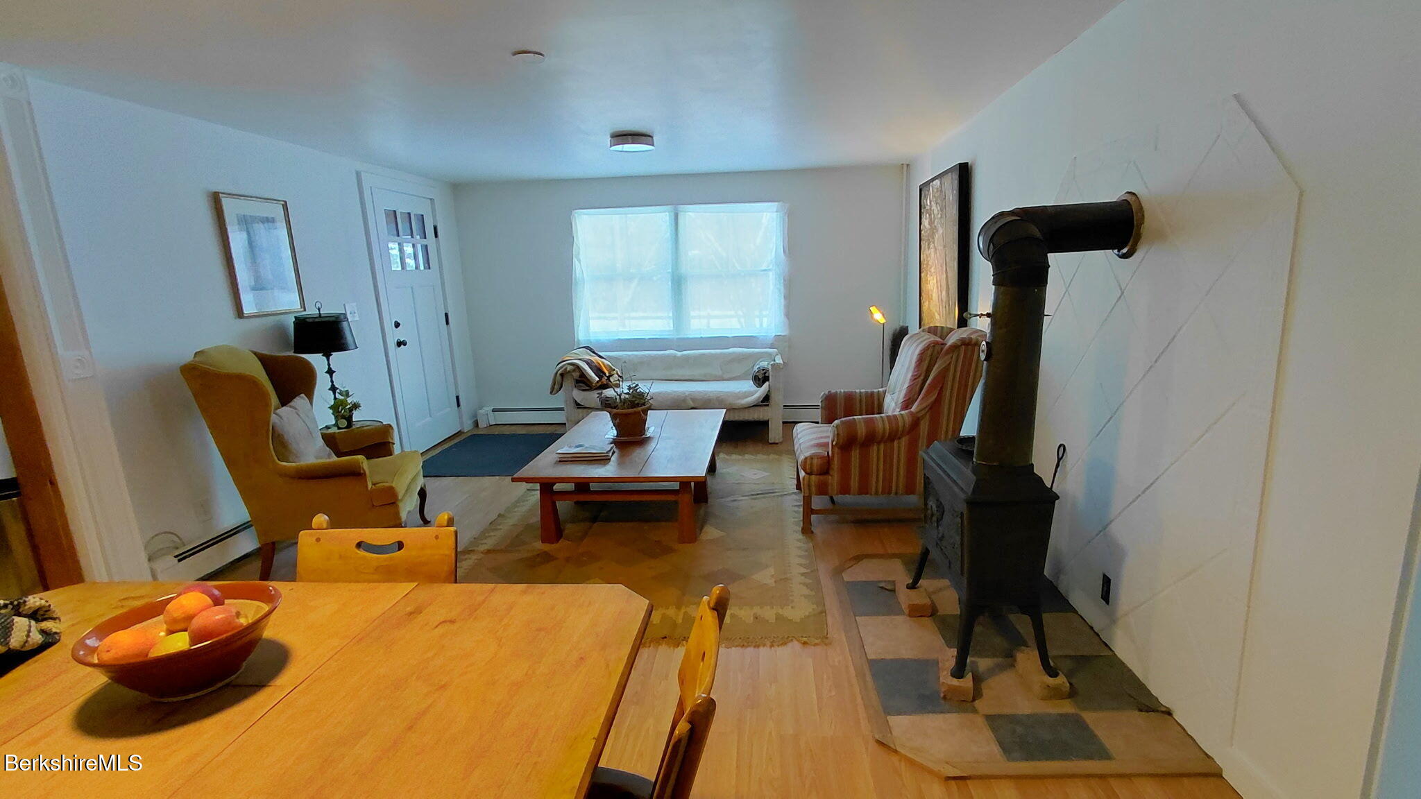 95 Water Farm Road Sheffield, MA 01257 - Photo 7 of 27 a living room with furniture and a rug