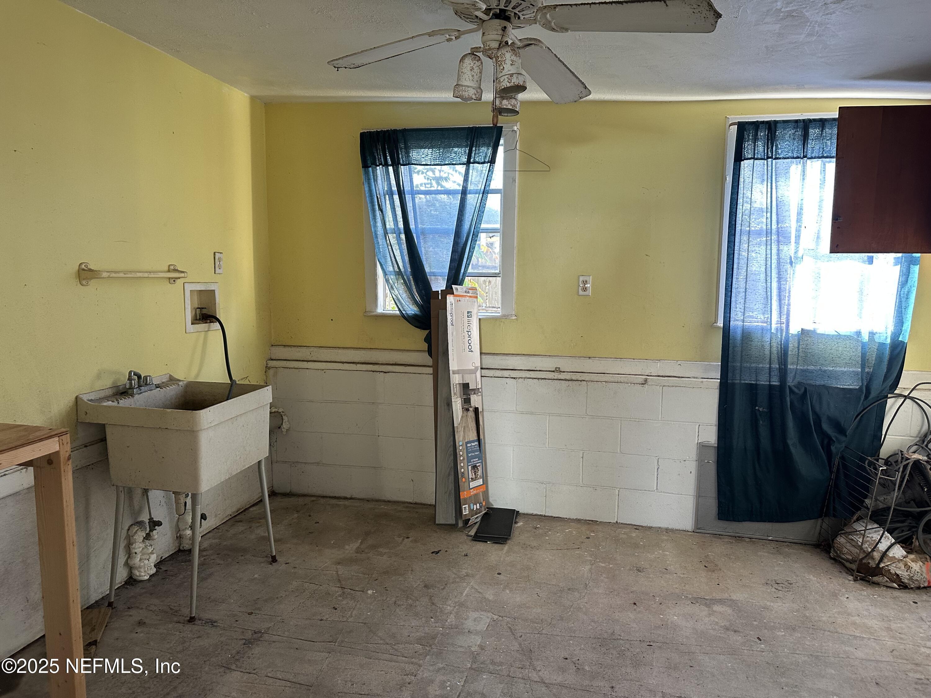 125 Waterside Avenue Satsuma, FL 32189 - Photo 16 of 32 a view of a livingroom with furniture and staircase