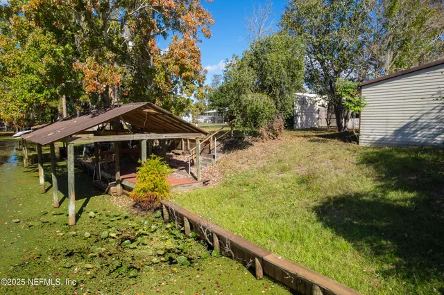 a house view with a garden space