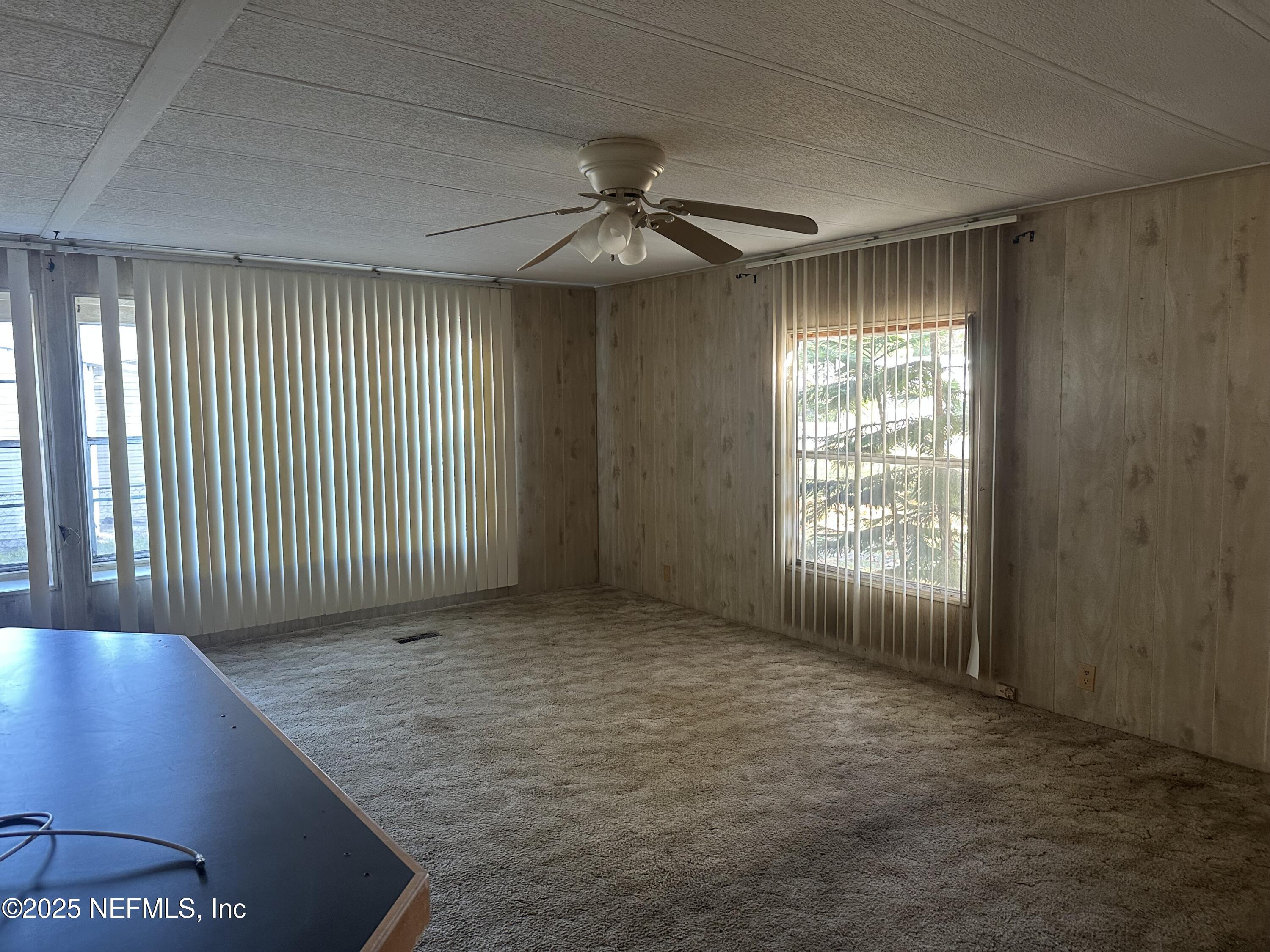 125 Waterside Avenue Satsuma, FL 32189 - Photo 7 of 32 a view of an empty room with a window