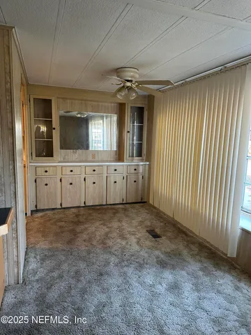 a view of an empty room with window