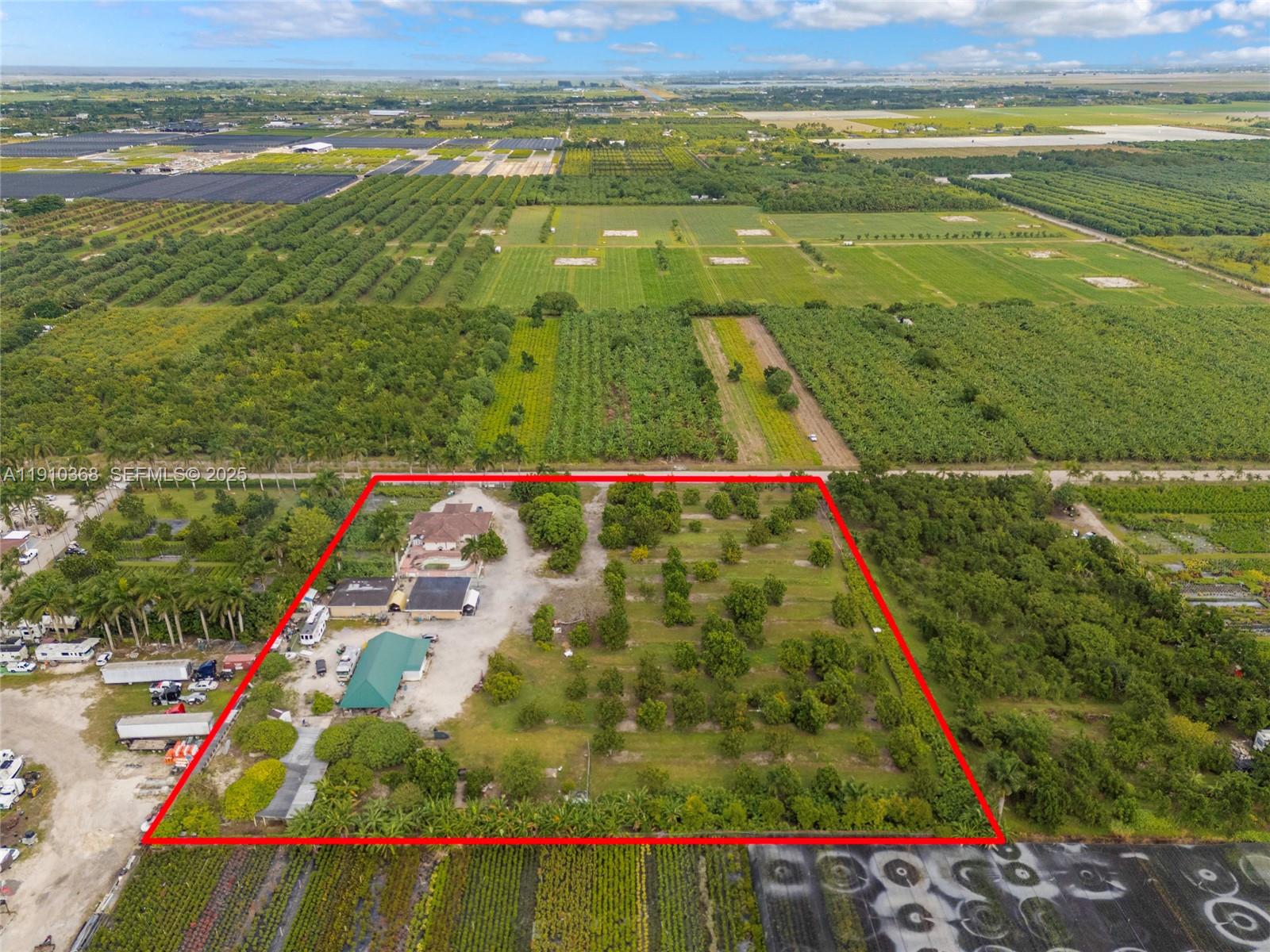 18890 Southwest 184th Street Miami, FL 33187 - Photo 12 of 37 a view of an outdoor space and a lake view