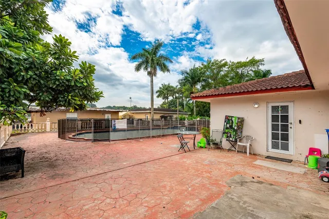 a view of a house with a patio
