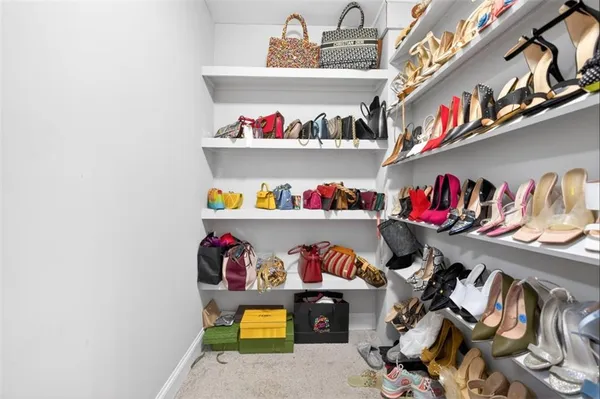 a view of hallway with wooden floor