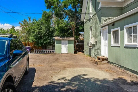 a backyard of a house with seating space
