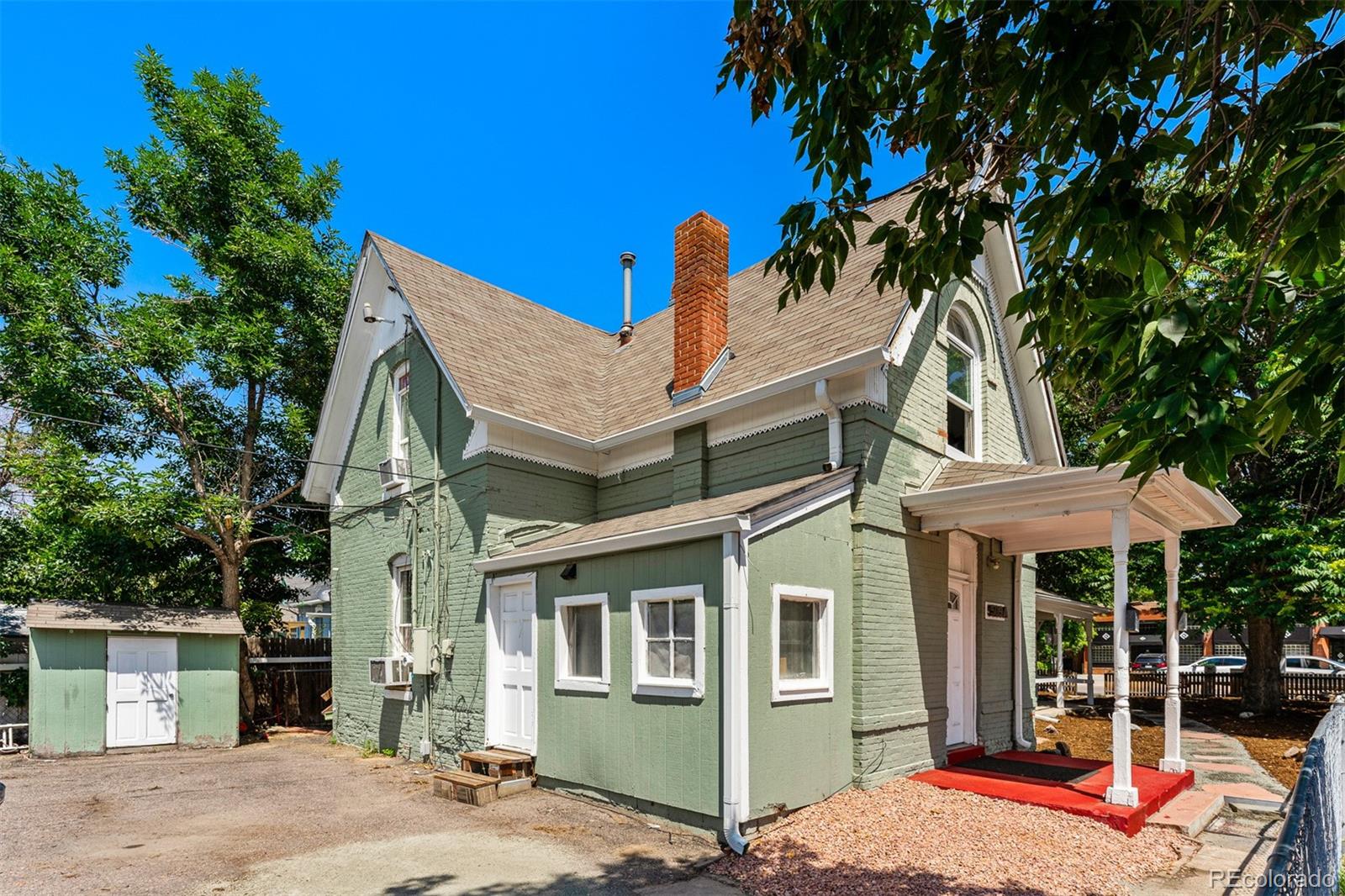 603 Elati Street Denver, CO 80204 - Photo 8 of 12 front view of a house with a porch