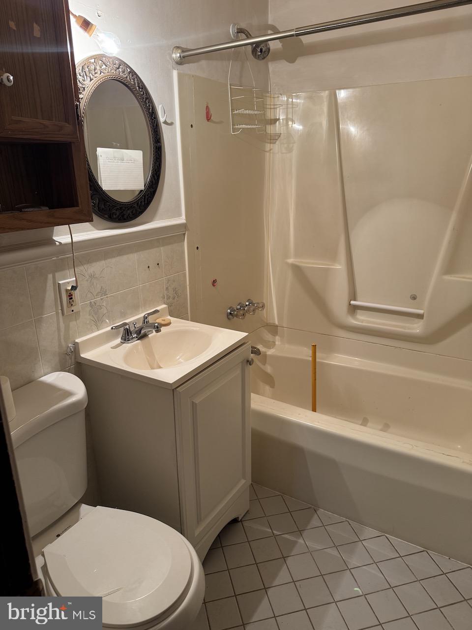6 Wardor Avenue New Castle, DE 19720 - Photo 6 of 8 a bathroom with a sink vanity mirror and toilet