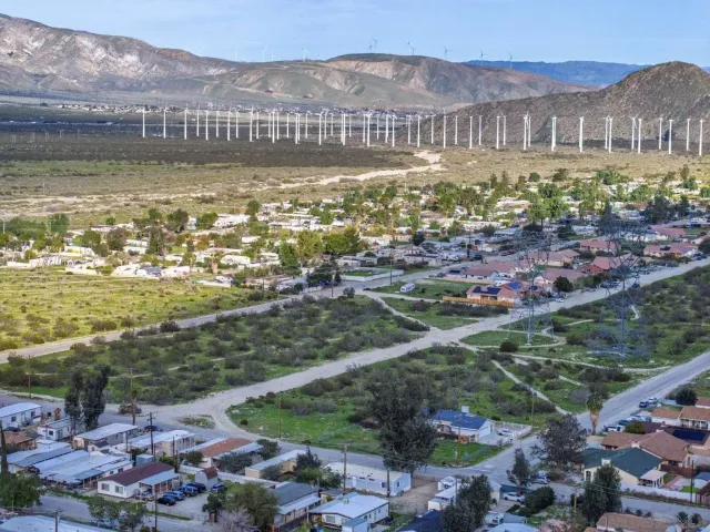 a view of a city with ocean