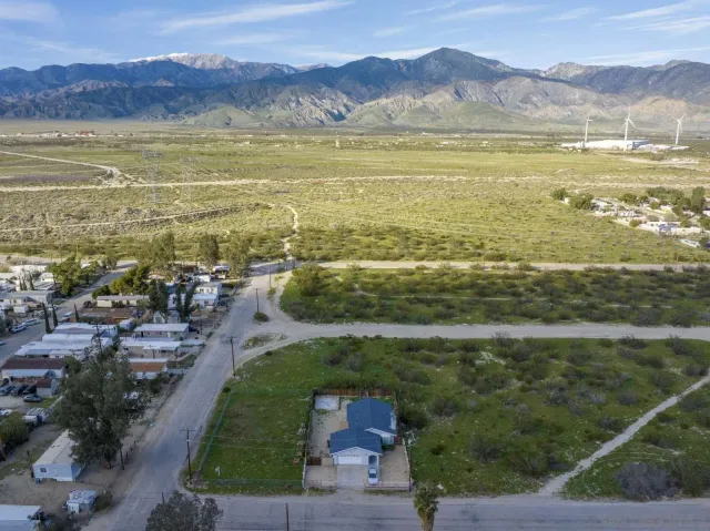 a view of an ocean and a mountain