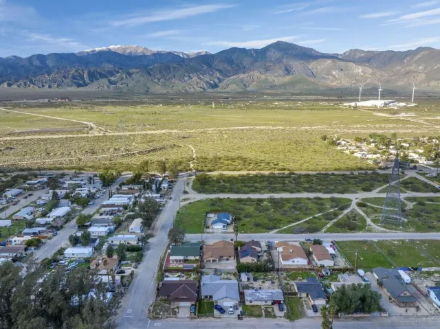 a view of a city with a lake