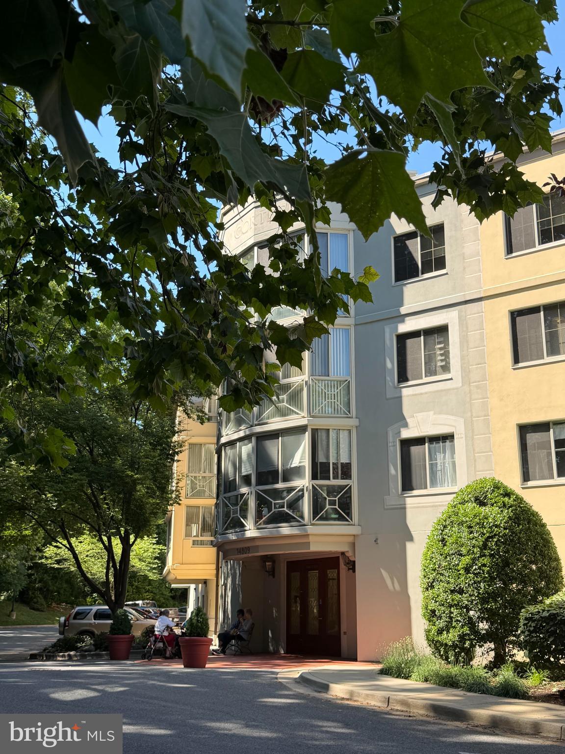 14809 Pennfield Circle, Unit 214 Silver Spring, MD 20906 - Photo 1 of 2 Lovely entrance with surrounding trees and shrubs
