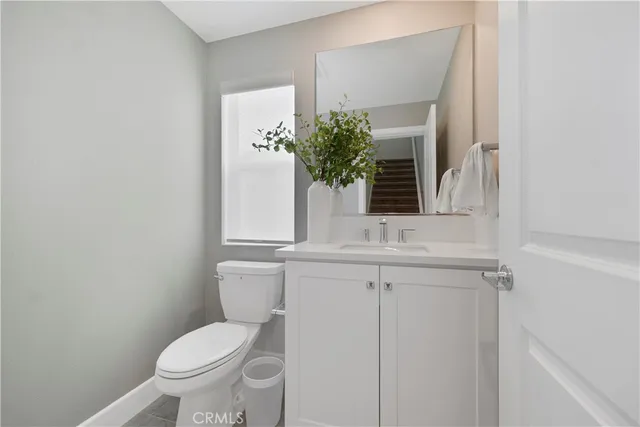 a view of a hallway with washer and dryer