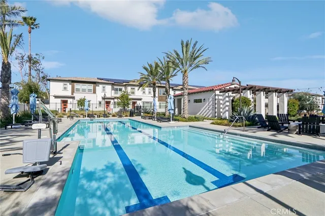 an aerial view of residential houses with city view