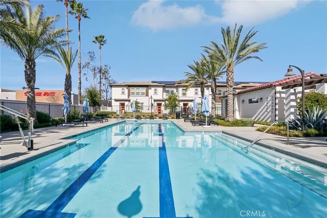 an aerial view of residential building with parking space