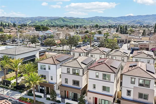 a view of a chairs and table in a patio
