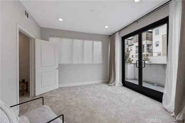 a view of room with furniture and entryway