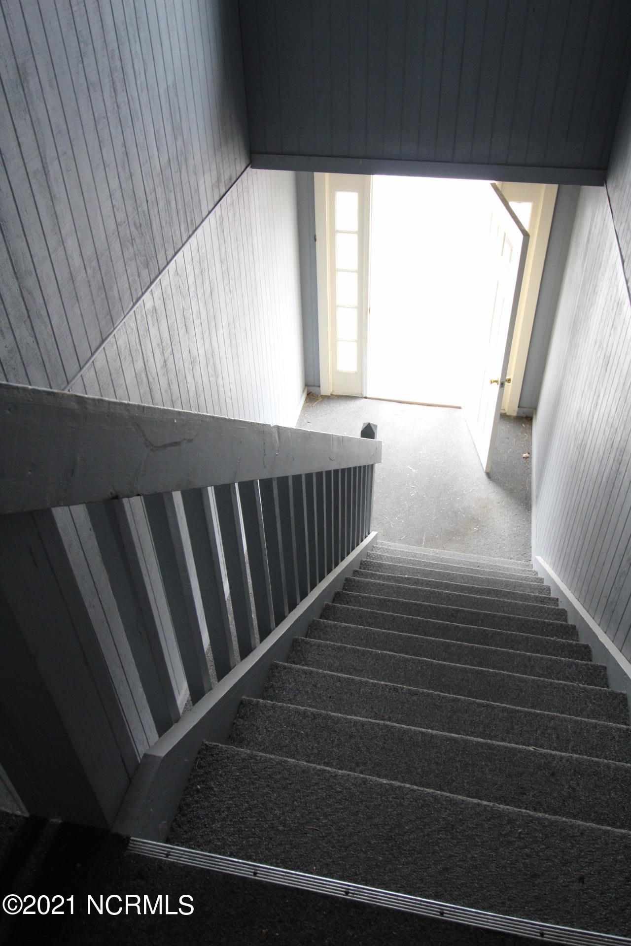 210 Shipman Road, Unit I Havelock, NC 28532 - Photo 8 of 20 Interior staircase going down