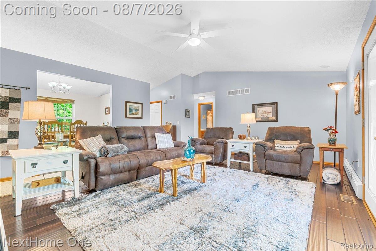 6260 Faussett Road Howell, MI 48855 - Photo 7 of 44 Living room with vaulted ceilings