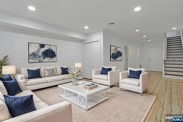 a living room with furniture and a couch