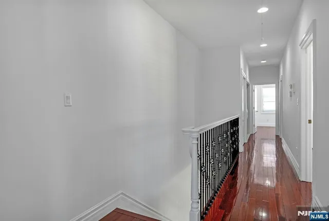 a view of hallway with stairs
