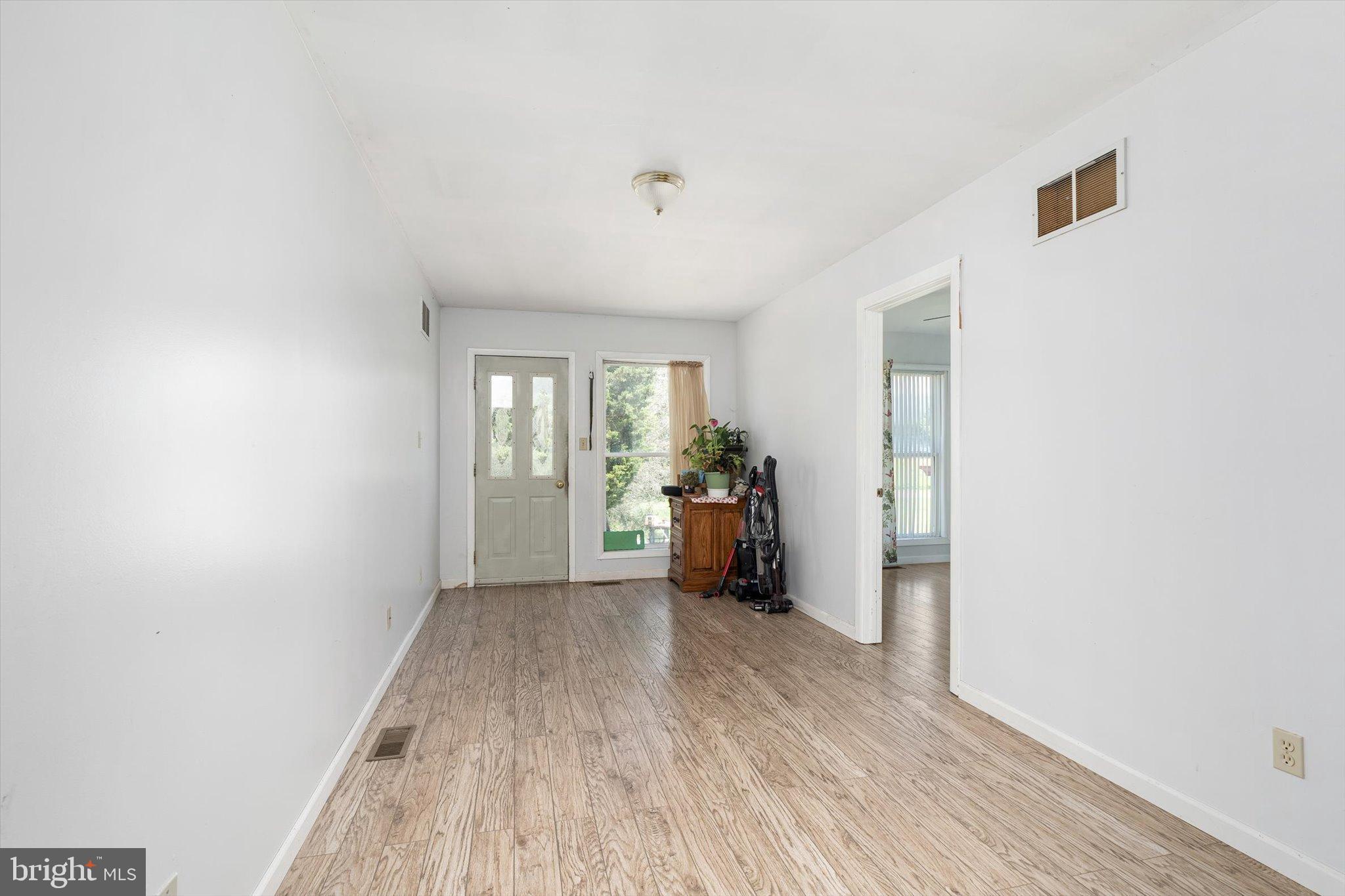 36 Allens Road Hightstown, NJ 08520 - Photo 15 of 43 a view of a room with wooden floor and windows