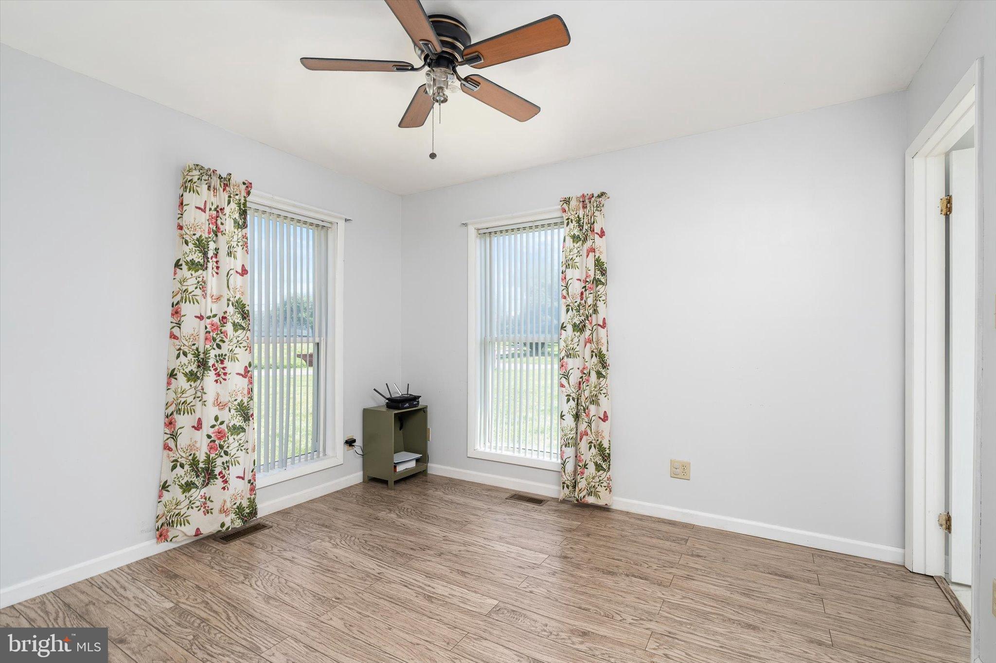 36 Allens Road Hightstown, NJ 08520 - Photo 16 of 43 a view of entryway with window and wooden floor