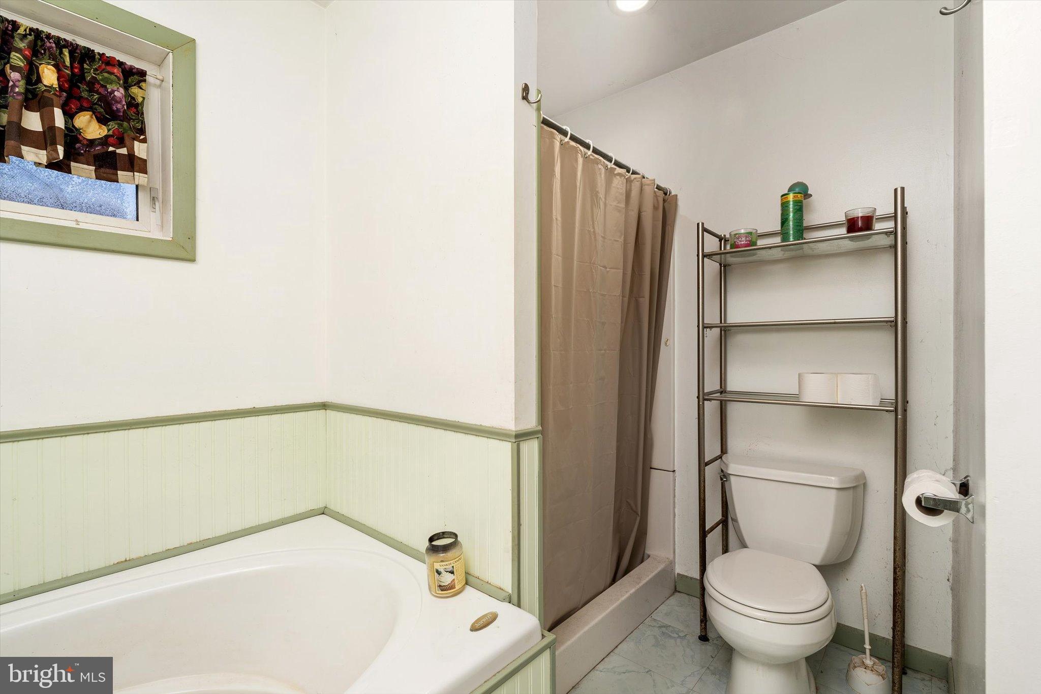 36 Allens Road Hightstown, NJ 08520 - Photo 22 of 43 a bathroom with a bathtub and a toilet