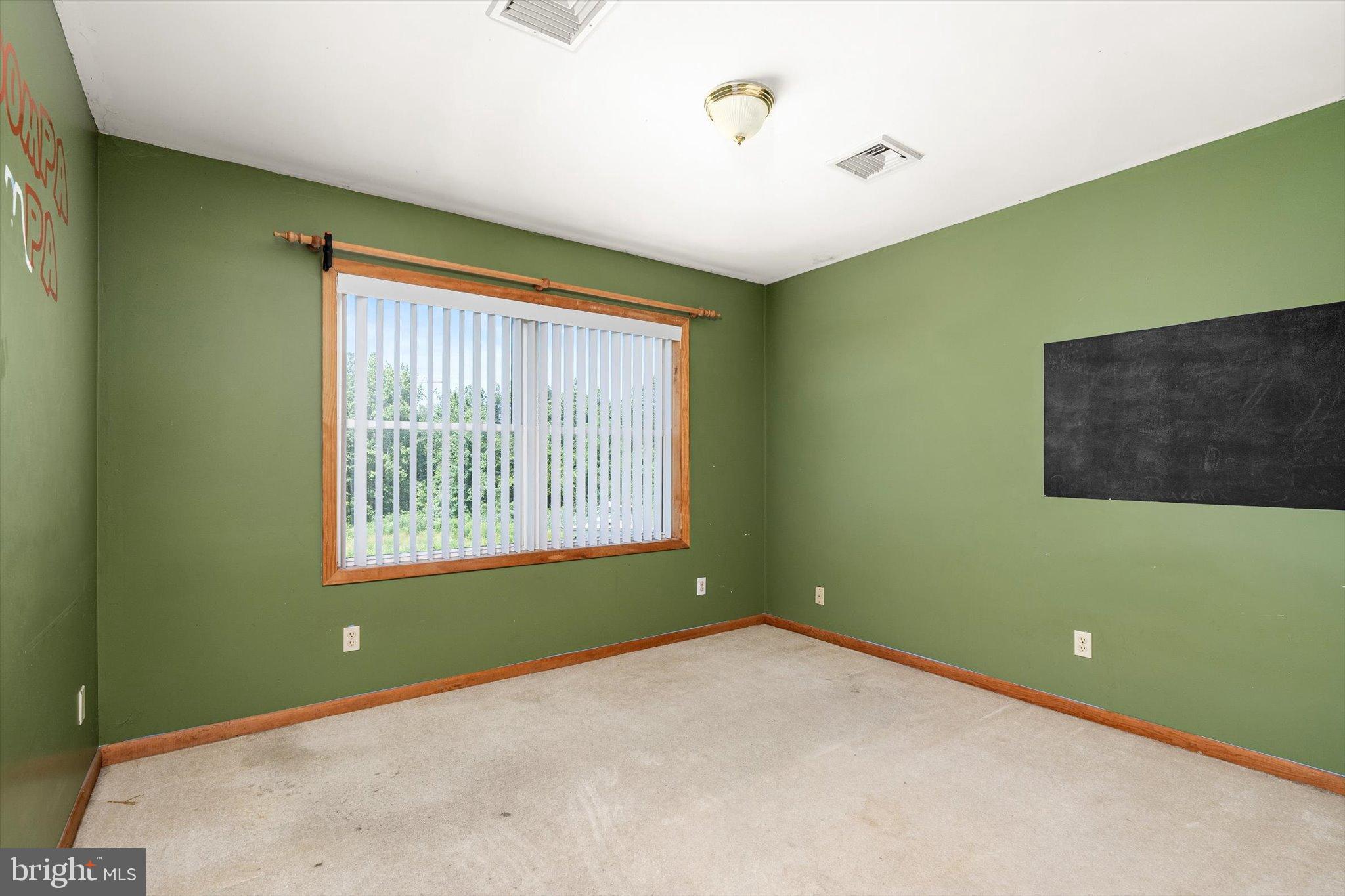 36 Allens Road Hightstown, NJ 08520 - Photo 24 of 43 a view of an empty room with a window