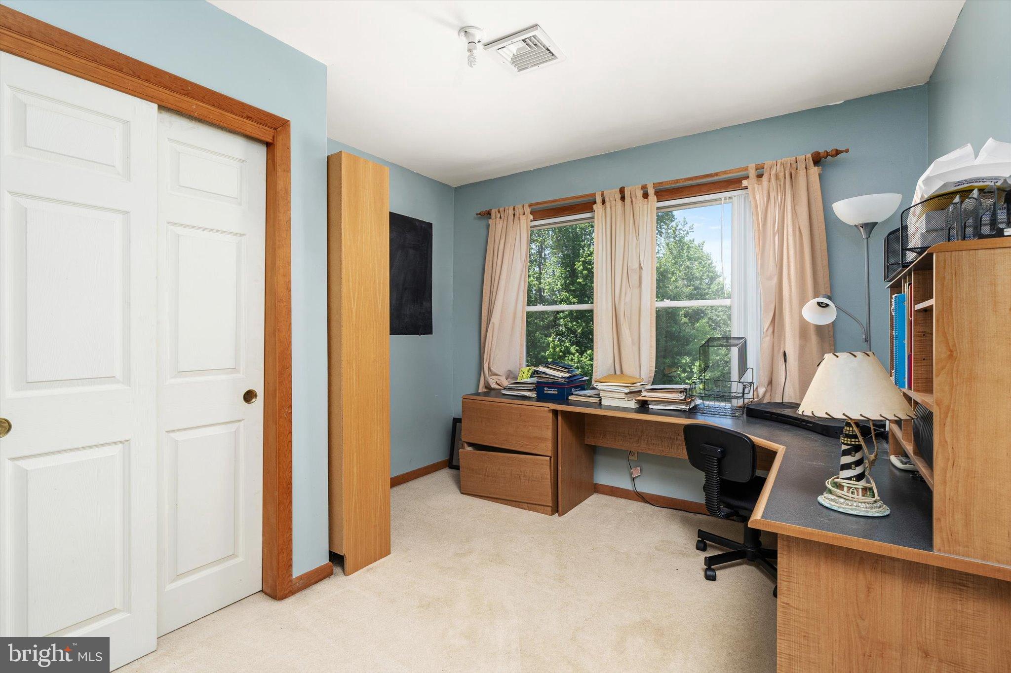 36 Allens Road Hightstown, NJ 08520 - Photo 25 of 43 a view of a livingroom with workspace and a window