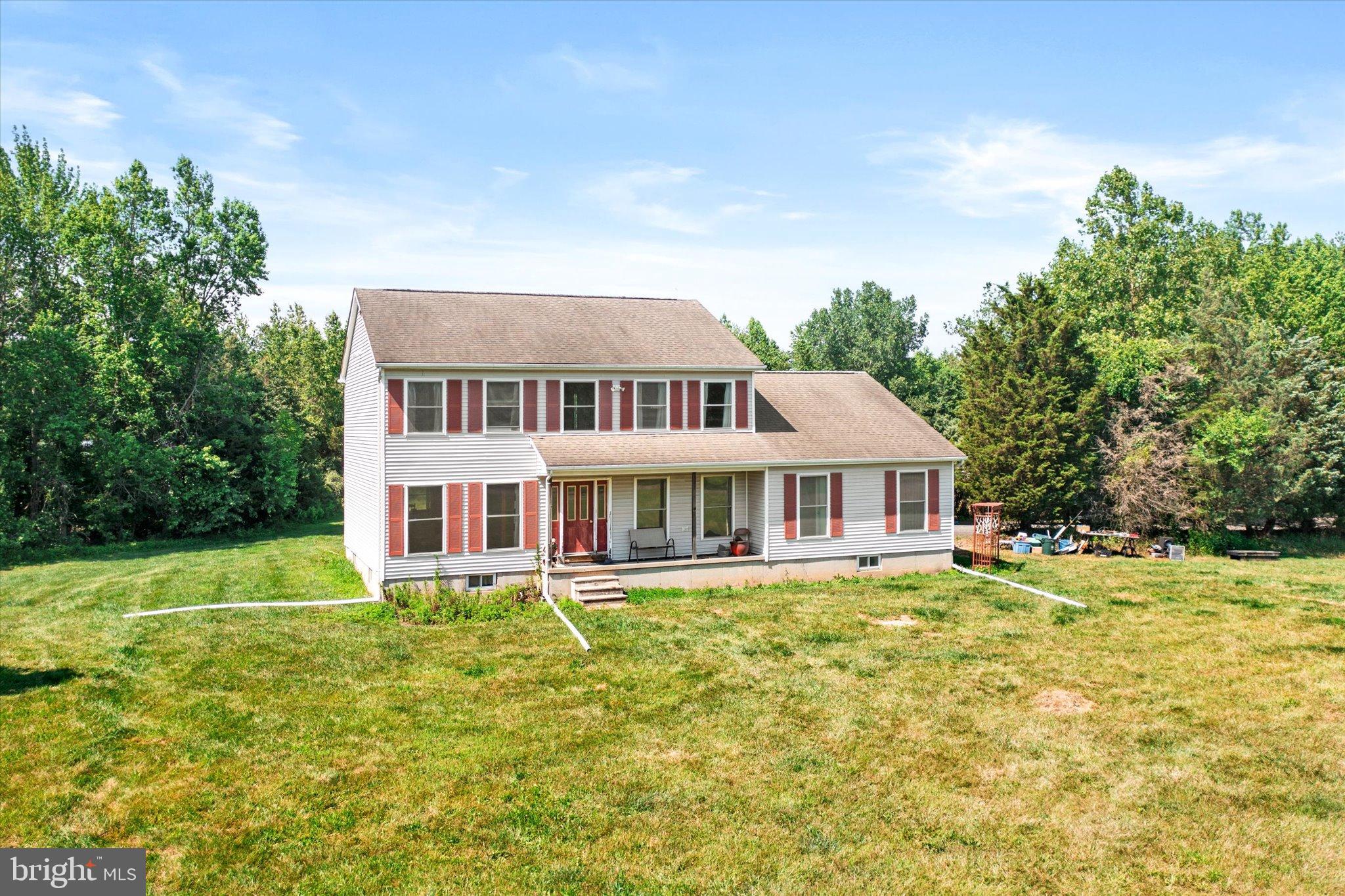 36 Allens Road Hightstown, NJ 08520 - Photo 33 of 43 a front view of a house with a garden