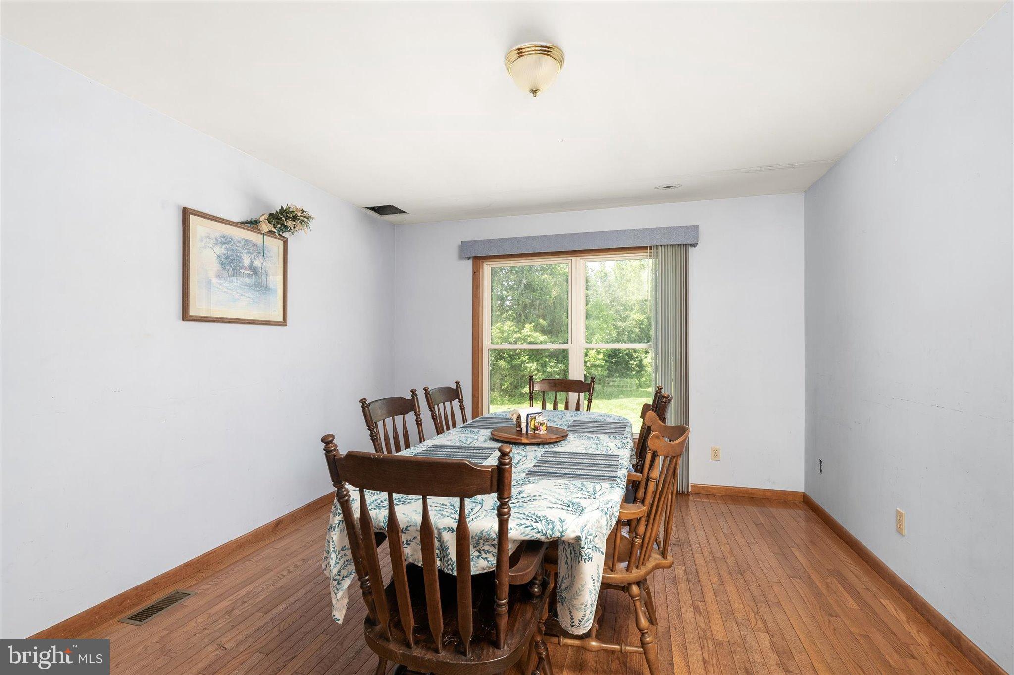 36 Allens Road Hightstown, NJ 08520 - Photo 6 of 43 a view of a dining room with furniture window and wooden floor