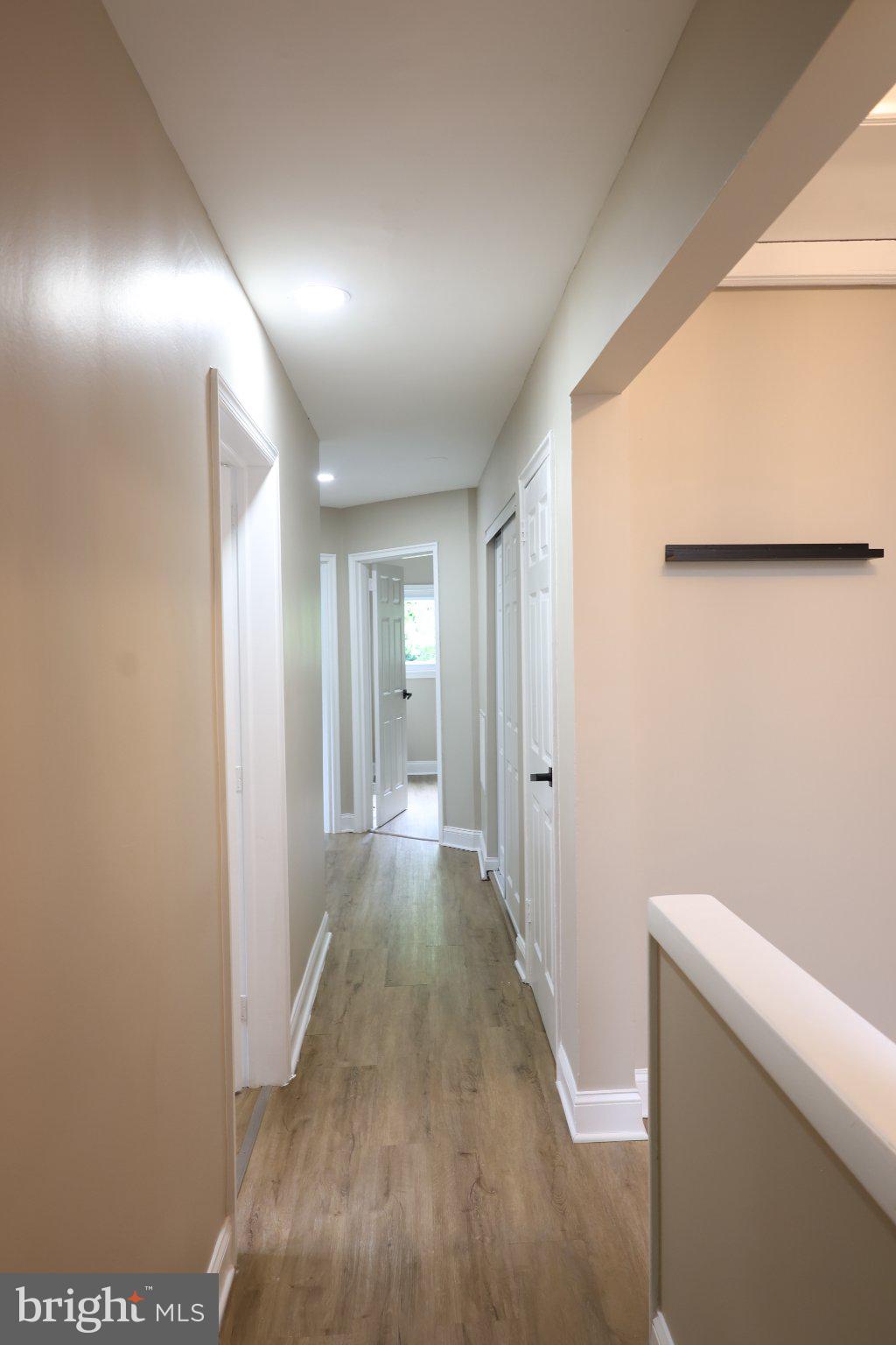 1316 Eastern Avenue Northeast Washington, DC 20019 - Photo 22 of 31 a view of a hallway with wooden floor