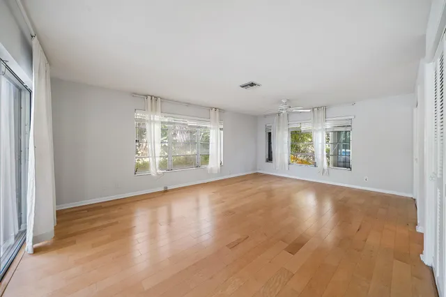 an empty room with windows