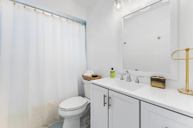 a bathroom with a sink and a toilet